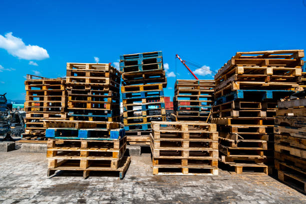 Stack of wooden pallets at warehouse