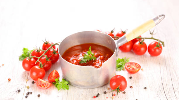 istock tomato sauce with fresh herbs and tomatoes in casserole 1286450735