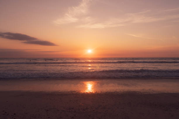 istock Tropical nature clean beach sunset sky time with sun light background. 1286454292