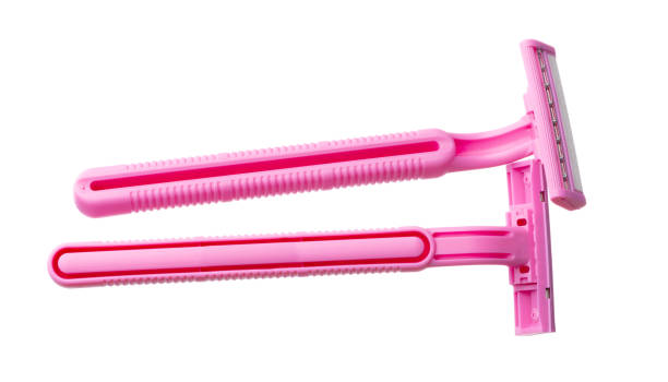 istock Female pink razor shaver isolated on white background 1286454305