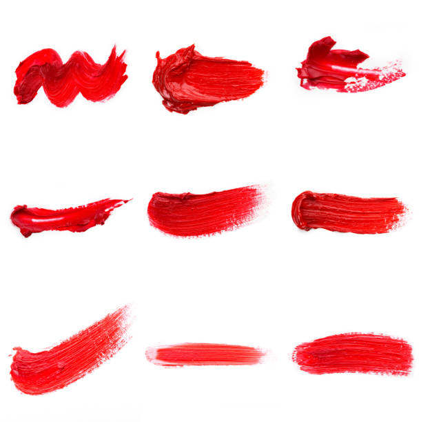 istock Lipstick smear smudge swatch isolated on white background. Cream makeup texture. Bright red color cosmetic product brush stroke swipe sample 1286457468