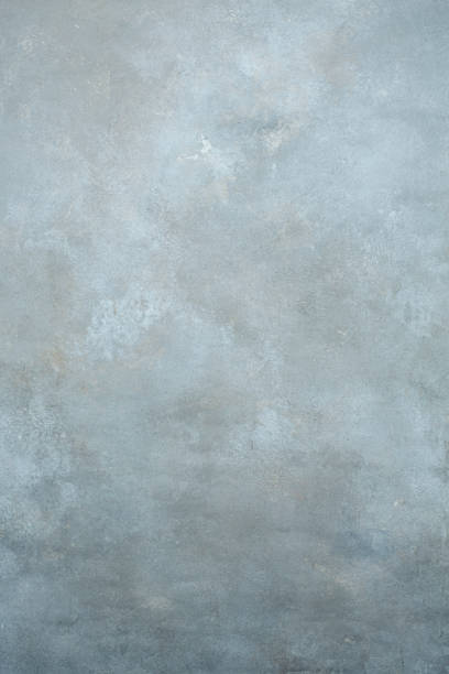 Beautiful  light grey hand-painted  textured backdrop studio wall stock photo