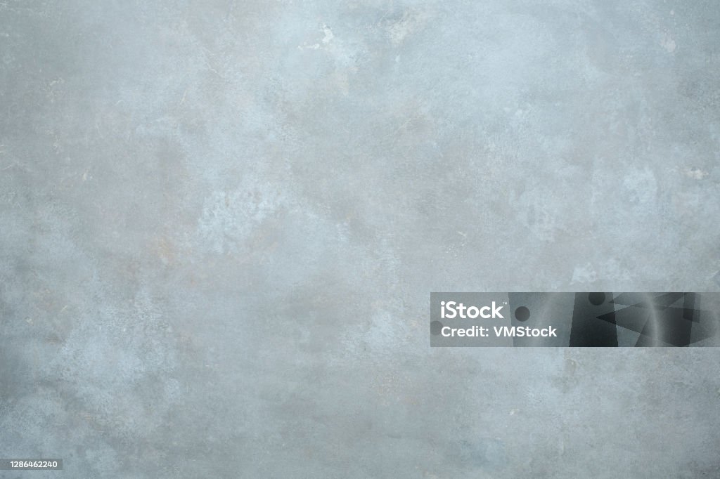 Light grey hand-painted  textured backdrop studio wall Backgrounds Stock Photo