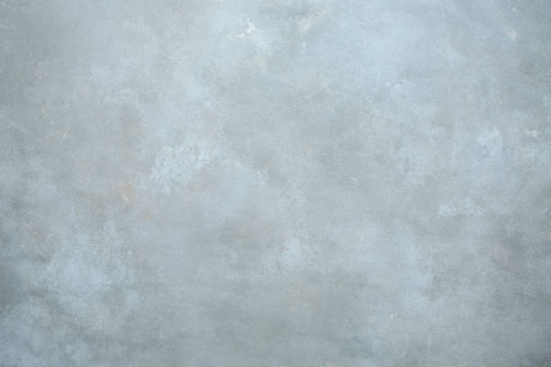 Light grey hand-painted  textured backdrop studio wall stock photo