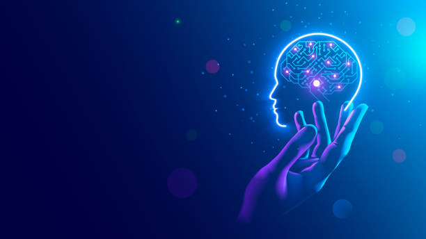 istock AI. Electronic brain. Neon Silhouette of human head with artificial intelligence hanging over palm hand. Cybernetic artificial neural network. Electronic mind. Neuronet, deep machine learning concept. 1286462278