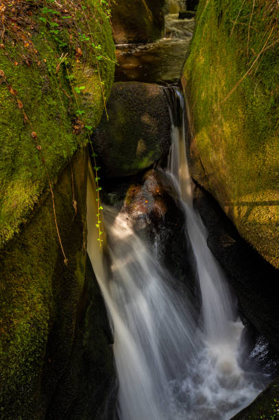 istock Small waterfall (Le Gouffre) in the forest of Huelgoat 1286463297