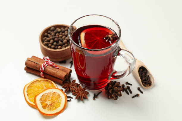 istock Cup of mulled wine and ingredients on white background 1286464963