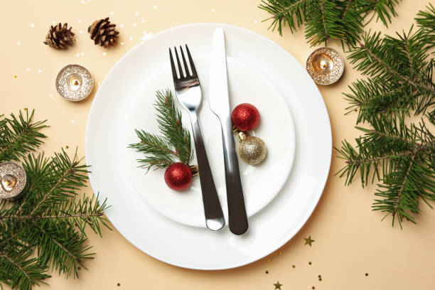 istock Concept of New year table setting on beige background, top view 1286466241