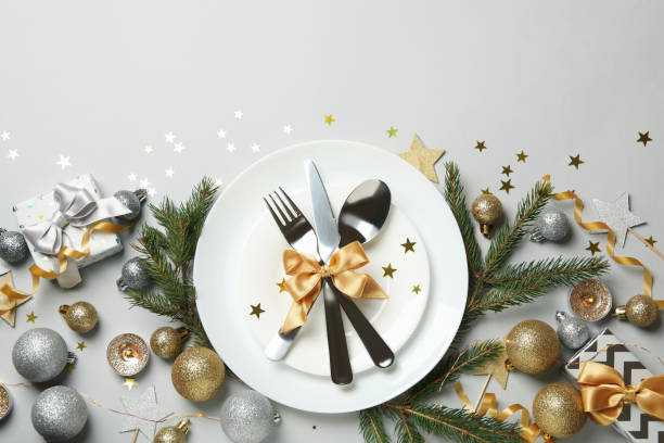 istock Concept of New year table setting on gray background, top view 1286466338