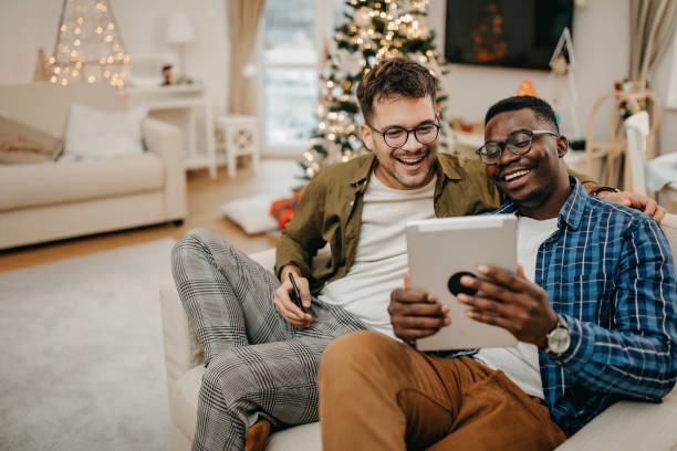 istock Two friends working from home during Christmas 1286468690