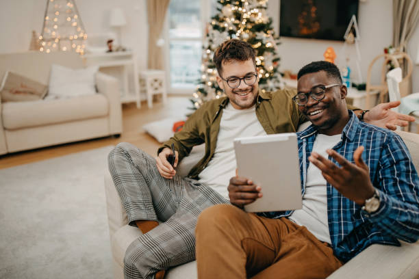 istock Two friends working from home during Christmas 1286468691
