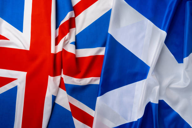 istock Flags of UK and Scotland folded together 1286469253