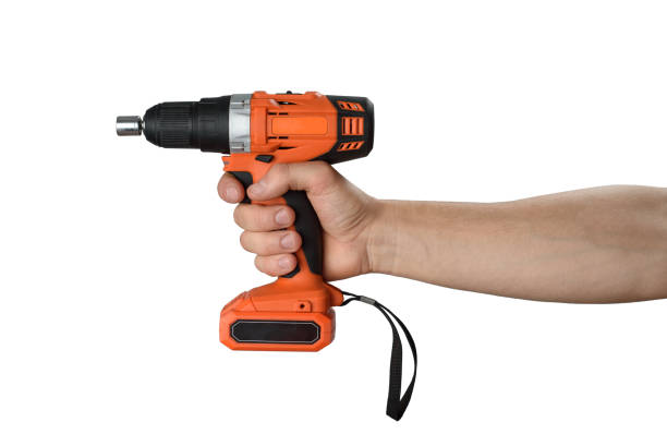 istock Man hand with screwdriver. Isolated object on white background. Do it youself 1286469980