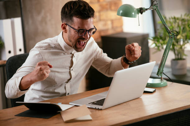 istock Stylish businessman working on a project in the office. 1286475964