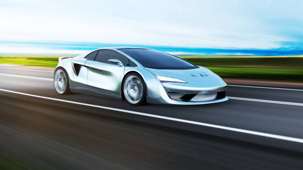 istock gray sportscar driving on a road 1286476808