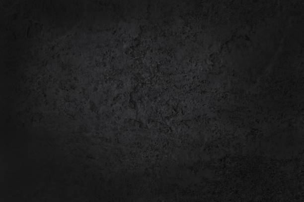 istock Dark grey black slate texture in natural pattern with high resolution for background and design art work. Black stone wall. 1286476900