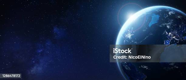 Planet Earth From Space With City Lights In Europe And North America World With Sun And Star Background Banner For Global Business International Finance Fintech Technology Elements From Nasa Stock Photo - Download Image Now