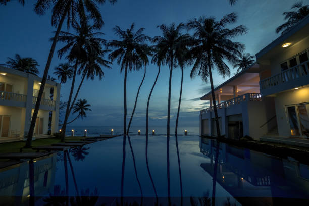 istock Swimming pool of luxury hotel at night 1286479565