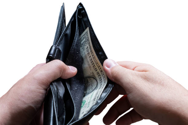 istock Hands holding almost empty wallet with one dollar. Poverty concept. Financial difficulties concept. Financial crisis, unemployment concept. 1286480983