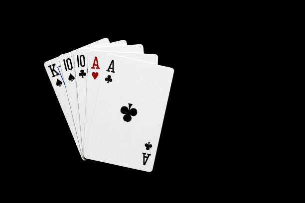 istock Two pair combination in poker on black background. Poker  combinations concept. 1286481188