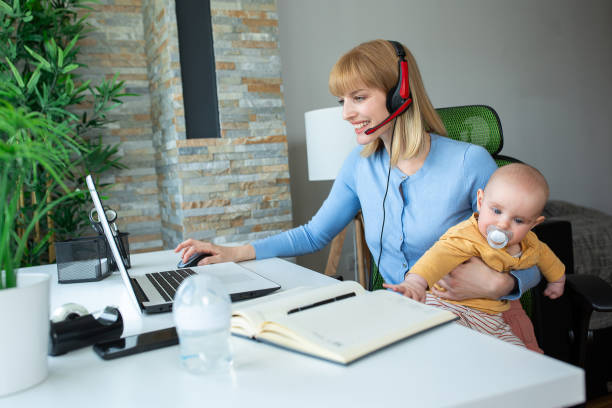 istock Young mother sitting and holding her child 1286482043