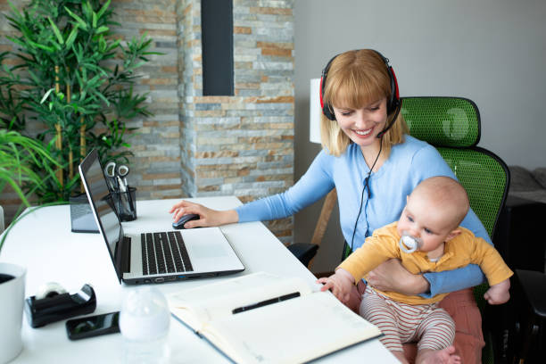 istock Young mother sitting and holding her child 1286482128