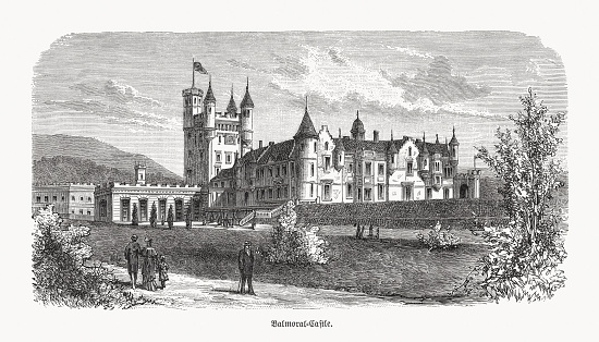 Historical view of the Balmoral Castle - large estate house in Royal Deeside, Aberdeenshire, Scotland and one of the residences of the British royal family. The castle was built in the 14th century as the seat of Sir William Drummond. Wood engraving, published in 1893.
