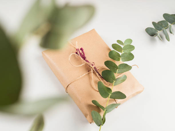 istock Gift boxes wrapped in craft paper with dried flowers 1286485477