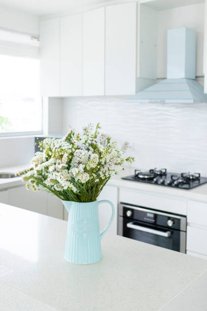 istock Cute flower arrangement in a home kitchen 1286494221