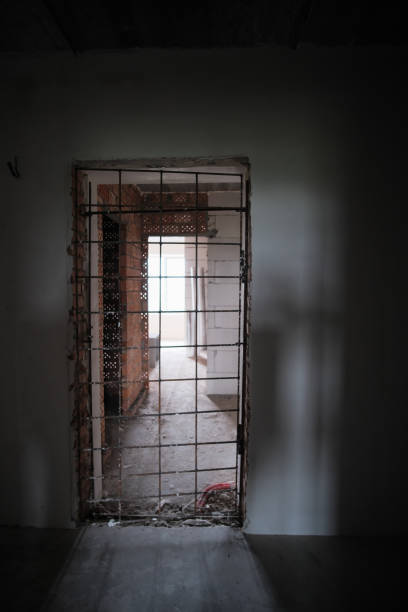 istock Doorway into an abandoned prison 1286495445