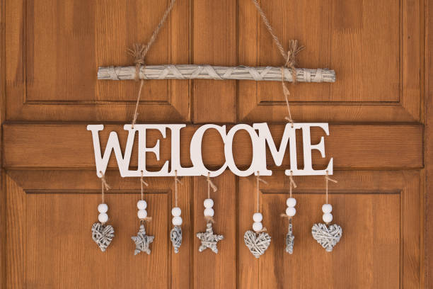 Welcome decoration on a wooden background