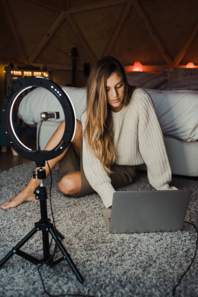 istock Young vlogger recording a video at home 1286500334