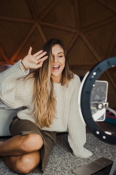 istock Young vlogger recording a video at home 1286500458