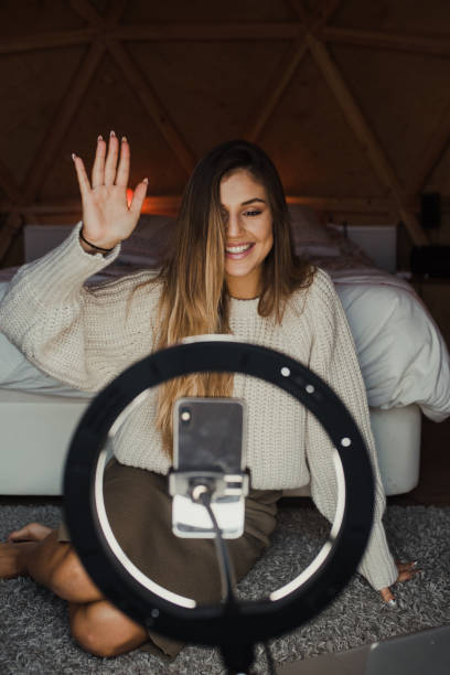 istock Young vlogger recording a video at home 1286500477