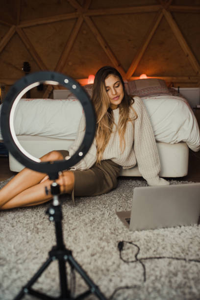 istock Young vlogger recording a video at home 1286500553