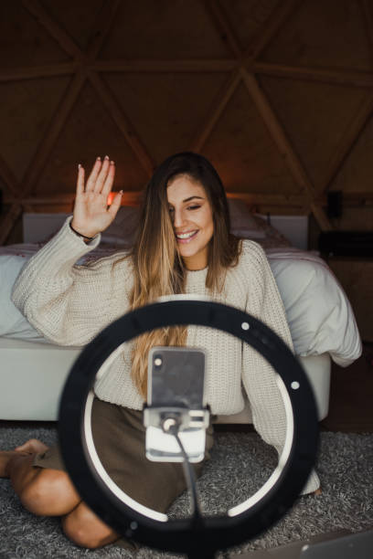 istock Young vlogger recording a video at home 1286500566