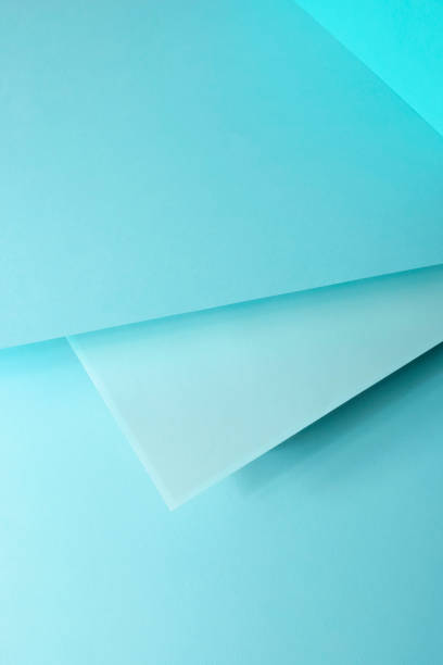 istock multi-level blue paper background, one paper on top of another 1286508197