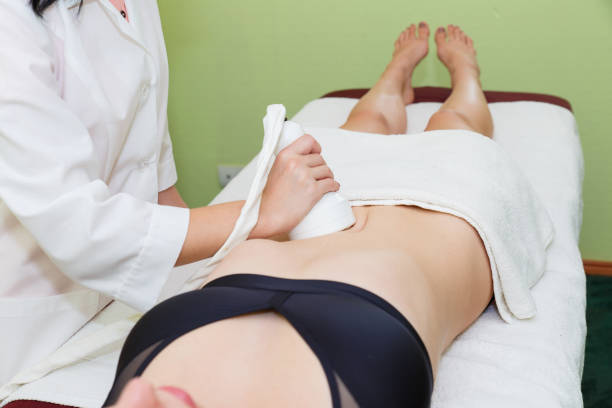 istock Anti-cellulite massage with cavitation on the abdomen 1286512920
