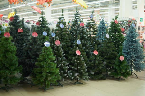 istock Selling various artificial Christmas trees in the store 1286513651