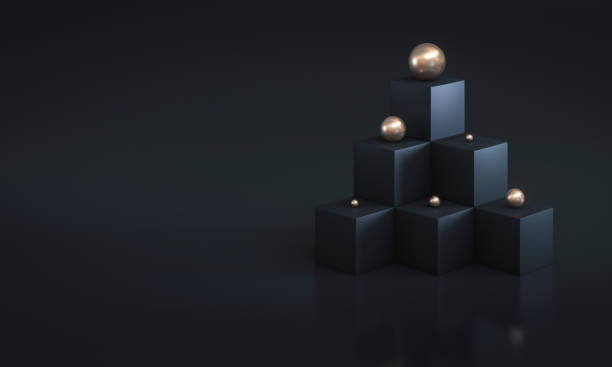 istock minimal background of black cubes and gold spheres 1286518658