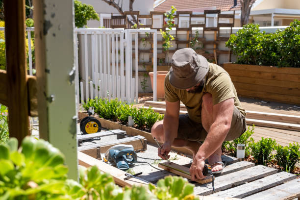 istock Man working on a DIY woodworking project at home 1286522529