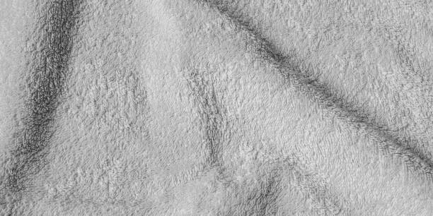 istock Crinkled gray cotton material with visible details 1286524944