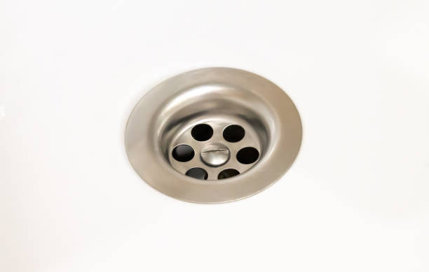 istock Sink drain or bathroom water drain isolated on white 1286527837