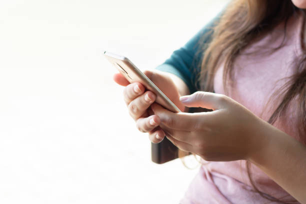 istock Woman using smartphone for online communication, shopping or work concept 1286527873