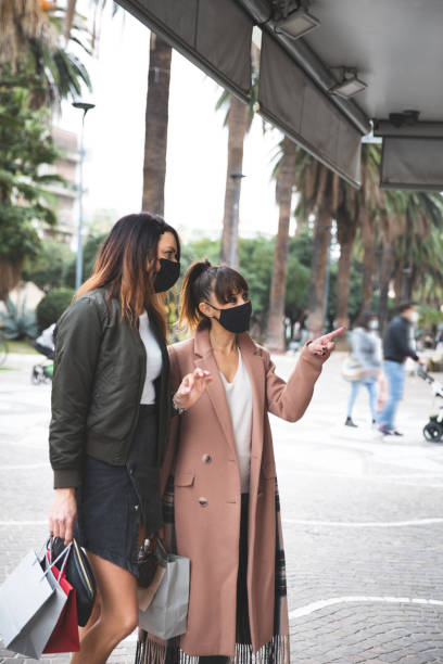 istock Friends in downtown go for Christmas shopping 1286528077