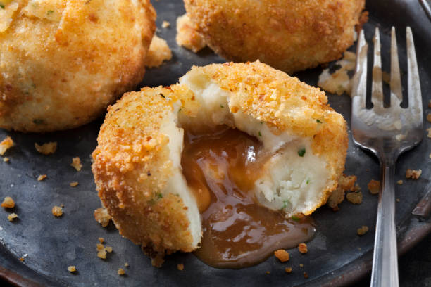 istock Creamy Mashed Potato Croquettes Stuffed with Gravy 1286528198