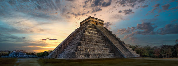 chichen itza during different sunsets in mexico - chinese temple dog imagens e fotografias de stock