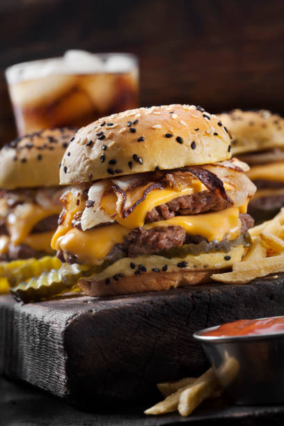 Double Cheese Burger Sliders with Fried Onions, Pickles on a Brioche Sesame Seed Bun