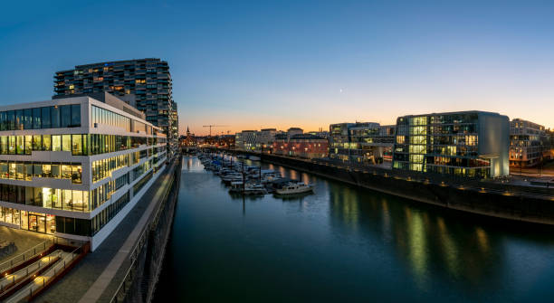 istock Cologne port skyline at dawn 1286532537