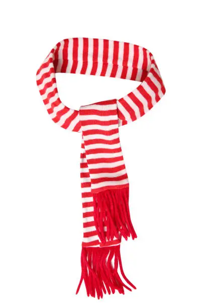 Photo of Red scarf stripped design tied and isolated on white background.Christmas decor element.New year symbol.